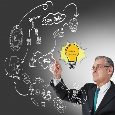 10079414 Businessman With Idea Lightbulb by Nutdanai Apikhomboonwaroot